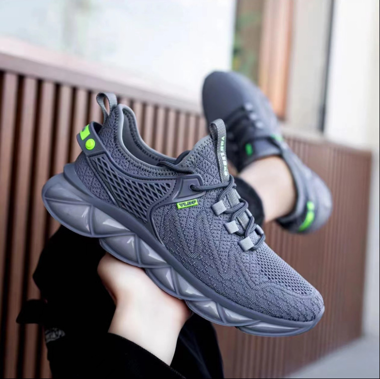 Nuevos zapatos deportivos para hombres a principios de la primavera 2025 tendencia zapatos casuales transpirables zapatos tejidos voladores de alta gama al por mayor