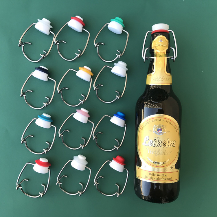 批发德国啤酒卡扣瓶盖果酒瓶高白料玻璃酒瓶弹簧盖摇摆盖秋千盖