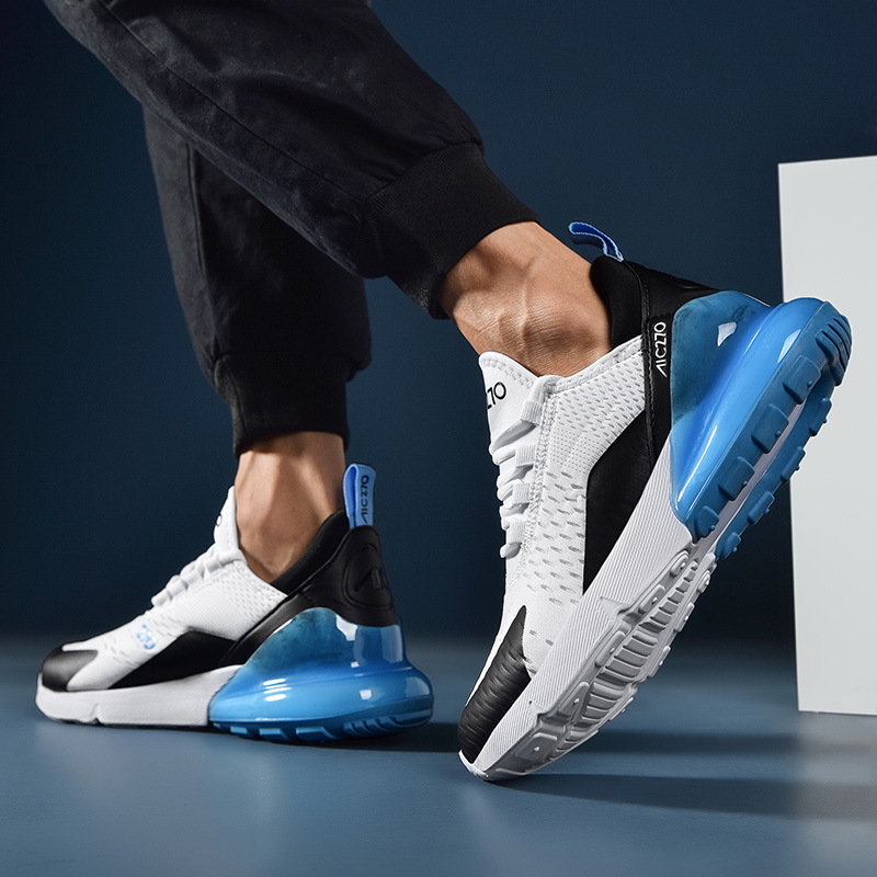 Zapatos deportivos casuales para parejas transfronterizas de primavera y verano, zapatillas para correr de malla transpirable, zapatos de moda para hombre, talla 270, talla grande de moda.