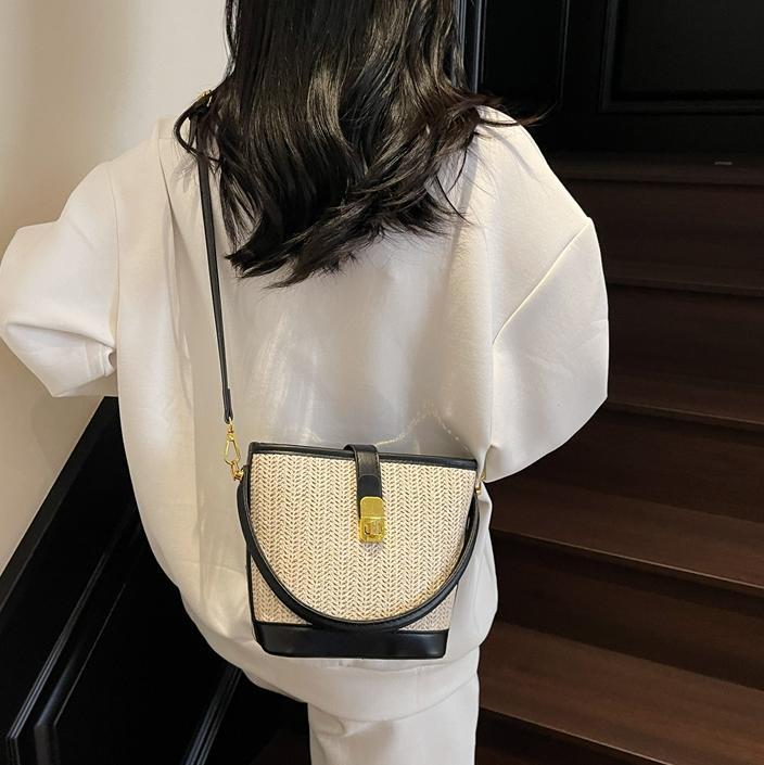 Bolsa de mano de tejido de verano super caliente para mujeres 2025 nuevo bolso de playa de vacaciones de alta calidad bolso de cubo de ocio