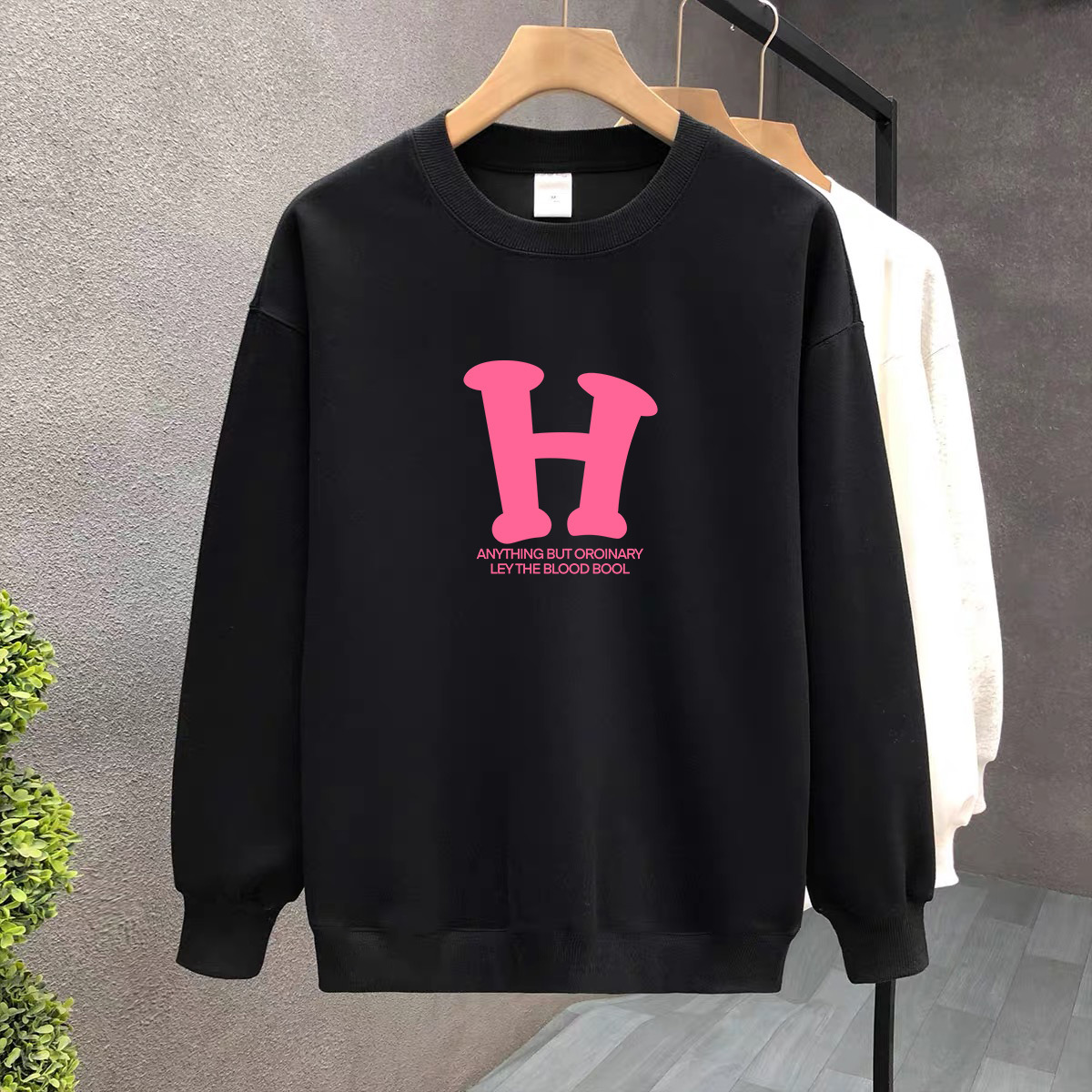 Suéter de algodón negro pesado de alta gama para mujeres 2025 otoño y invierno nuevo estilo europeo y americano camiseta de manga larga fondo suéter de estudiante