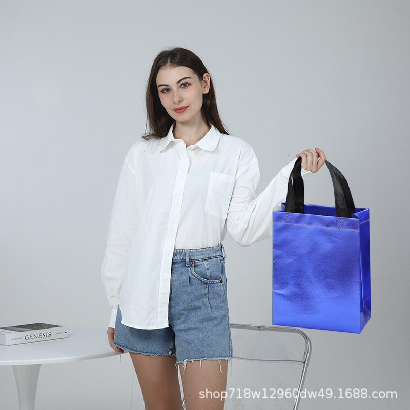 En stock nueva bolsa de regalo no tejida láser bolsa de regalo de boda bolsa de fiesta de comercio exterior logotipo imprimible