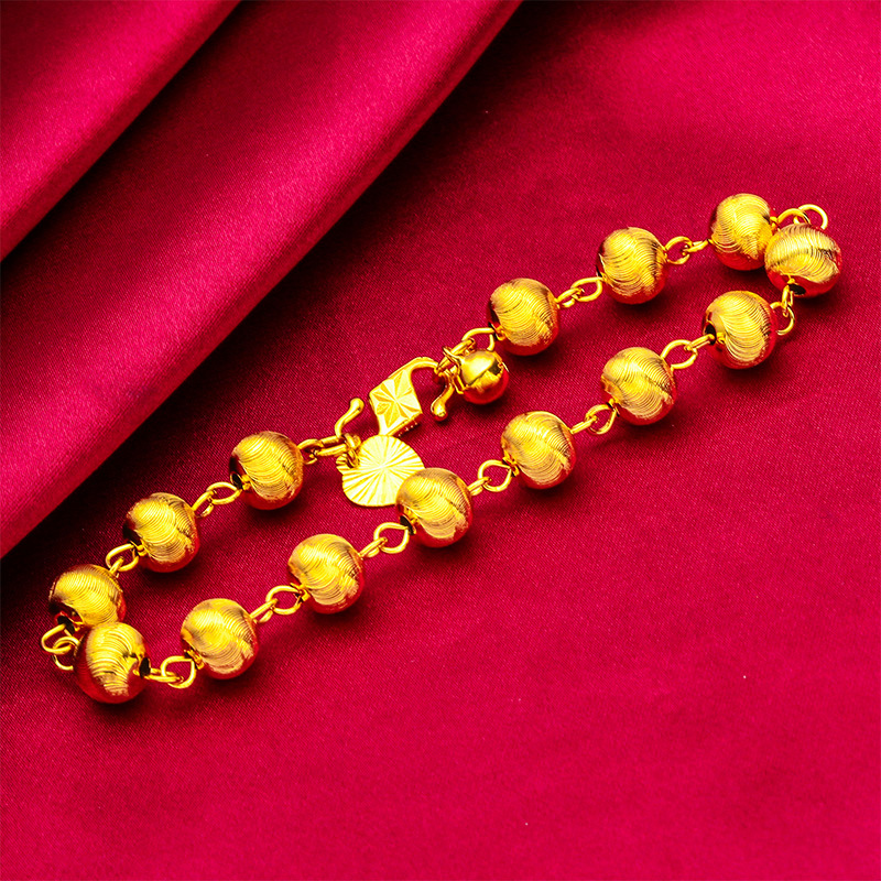 Pulsera unisex de moda con diseño de ojo de gato en oro y arena_voghion.com