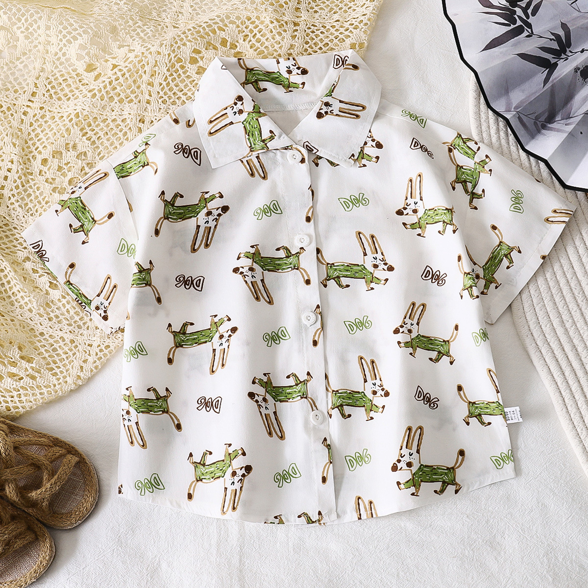 Camisas infantiles de verano nuevos niños Cardigan de mangas cortas bebés de algodón de moda camisa de solapa estricta selección de enlaces