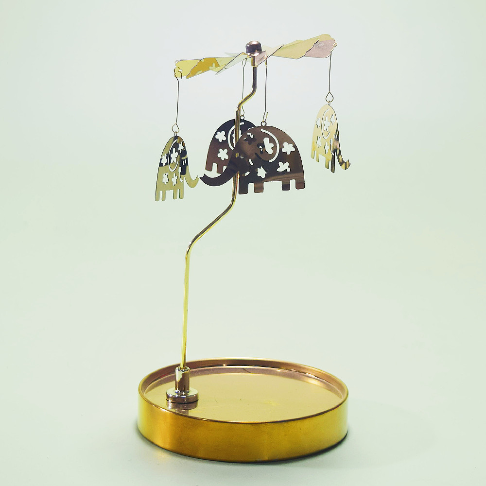 Fuente fabricante al por mayor Amazon INS bandeja redonda de acero inoxidable linterna giratoria giratoria candelabro de aromaterapia giratoria