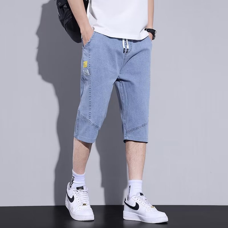 Moda de mezclilla de verano tendencia de los hombres sueltos rectos tallas grandes pantalones recortados marca de moda de los hombres pantalones medios de 7 puntos estilo fino de verano