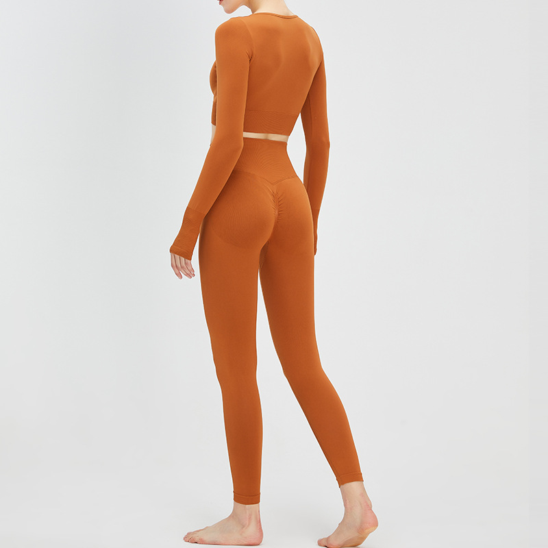 Europea y americana con cuello en V sexy yoga traje melocotón cadera levantamiento ejercicio traje de las mujeres del mismo color fitness al aire libre conjunto de dos piezas