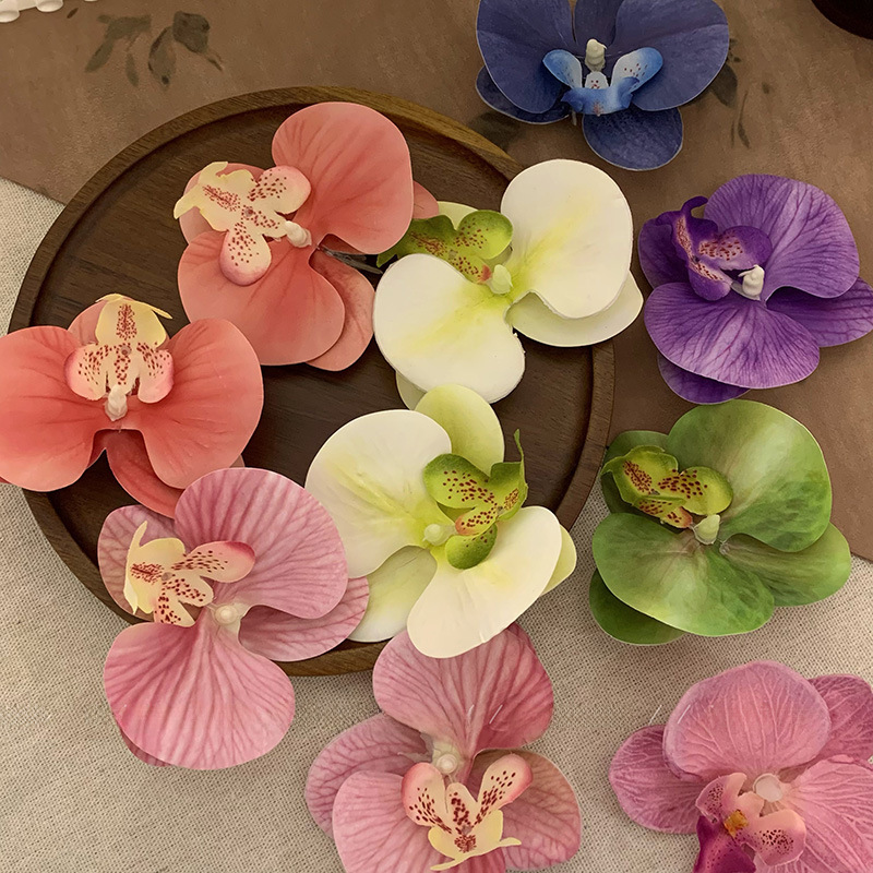 Wearing flower phalaenopsis side clip hairpin in this world, atmosphere feeling, photo, hair clip, seaside holiday hair accessories, headdress_voghion.com