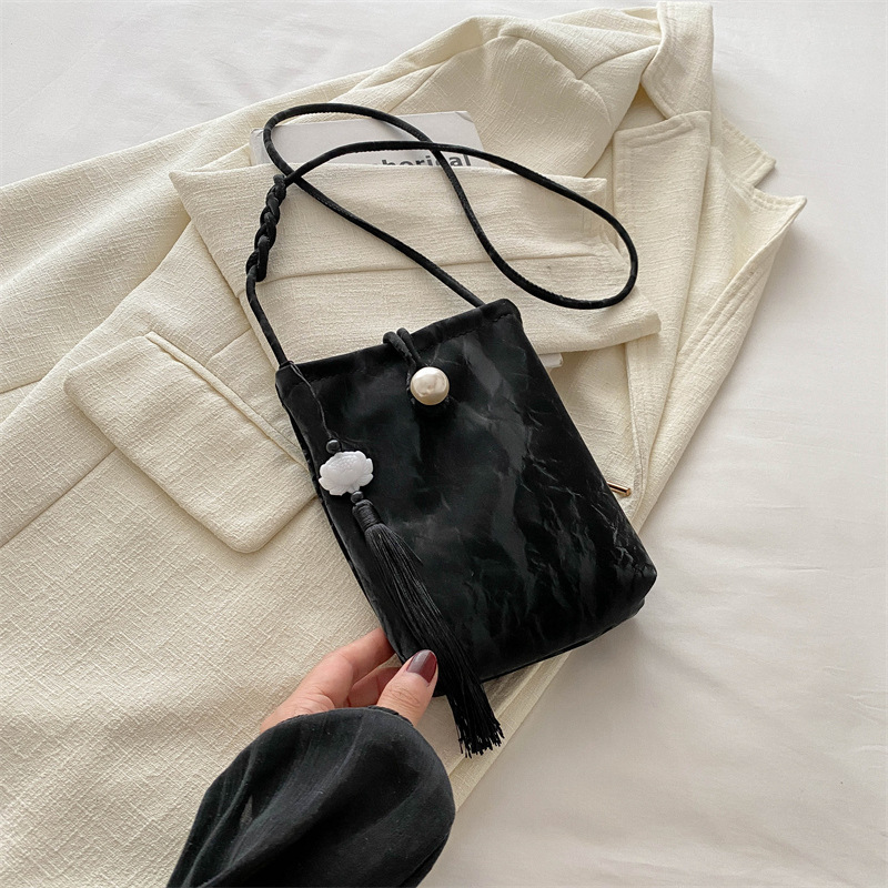 Nueva bolso chino para mujeres 2024 verano nuevo estilo nacional bolso de mano pequeño bolso ligero con cheongsam perla bolso móvil