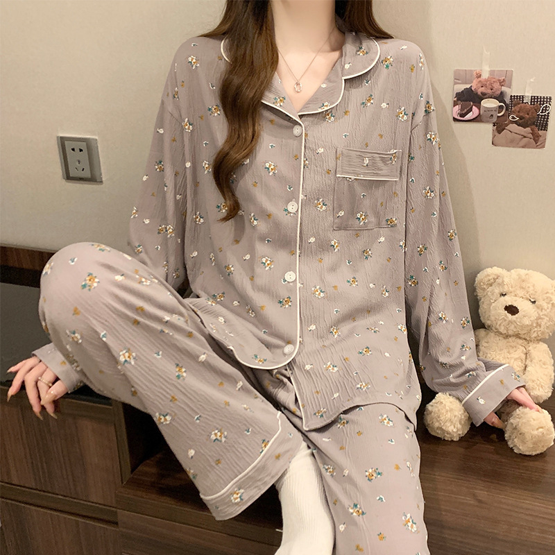 蝶結びのさくらんぼのプリントの女性のパジャマの春と秋の新型のカーディガンの長袖のズボンの部屋の服のスーツは実際に卸売りをたたきます。|undefined