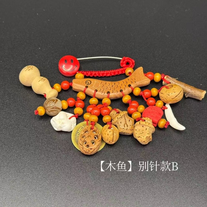 手作りの真桃の木の犬の歯の豚の驚きの骨のヒョウタンの桃のかごのピンの掛け物の赤ちゃんの妊婦は身につけて無事です。|undefined