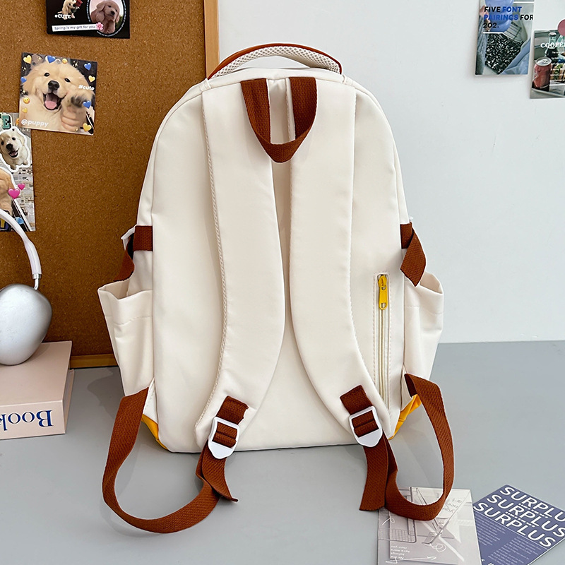 Mochila de gran capacidad 2024 nueva mochila de color en contraste para estudiantes al aire libre viajes de ocio mochila de todo fósforo para mujeres al por mayor