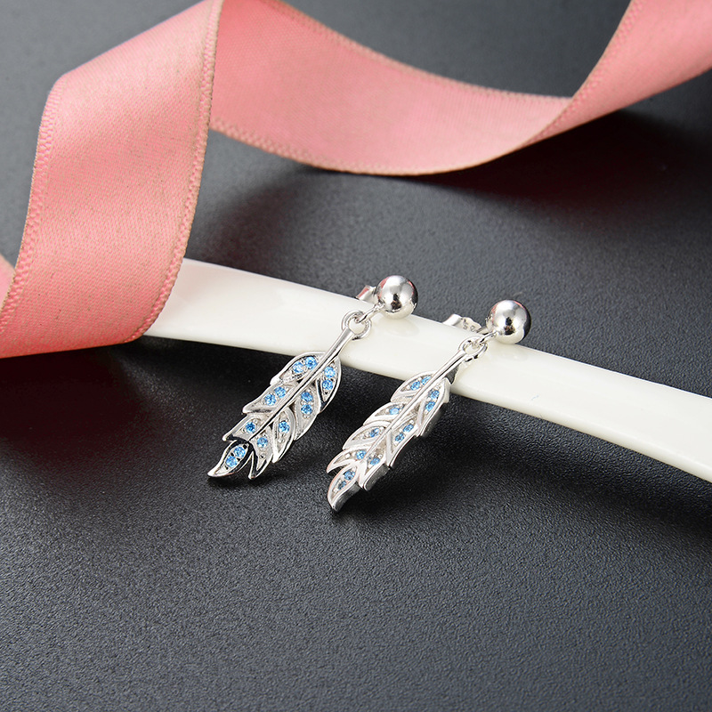 Comercio exterior nuevo estilo japonés y coreano s925 pendientes de diamantes de plata pequeña joyería popular fresca pendientes de plumas personalizadas