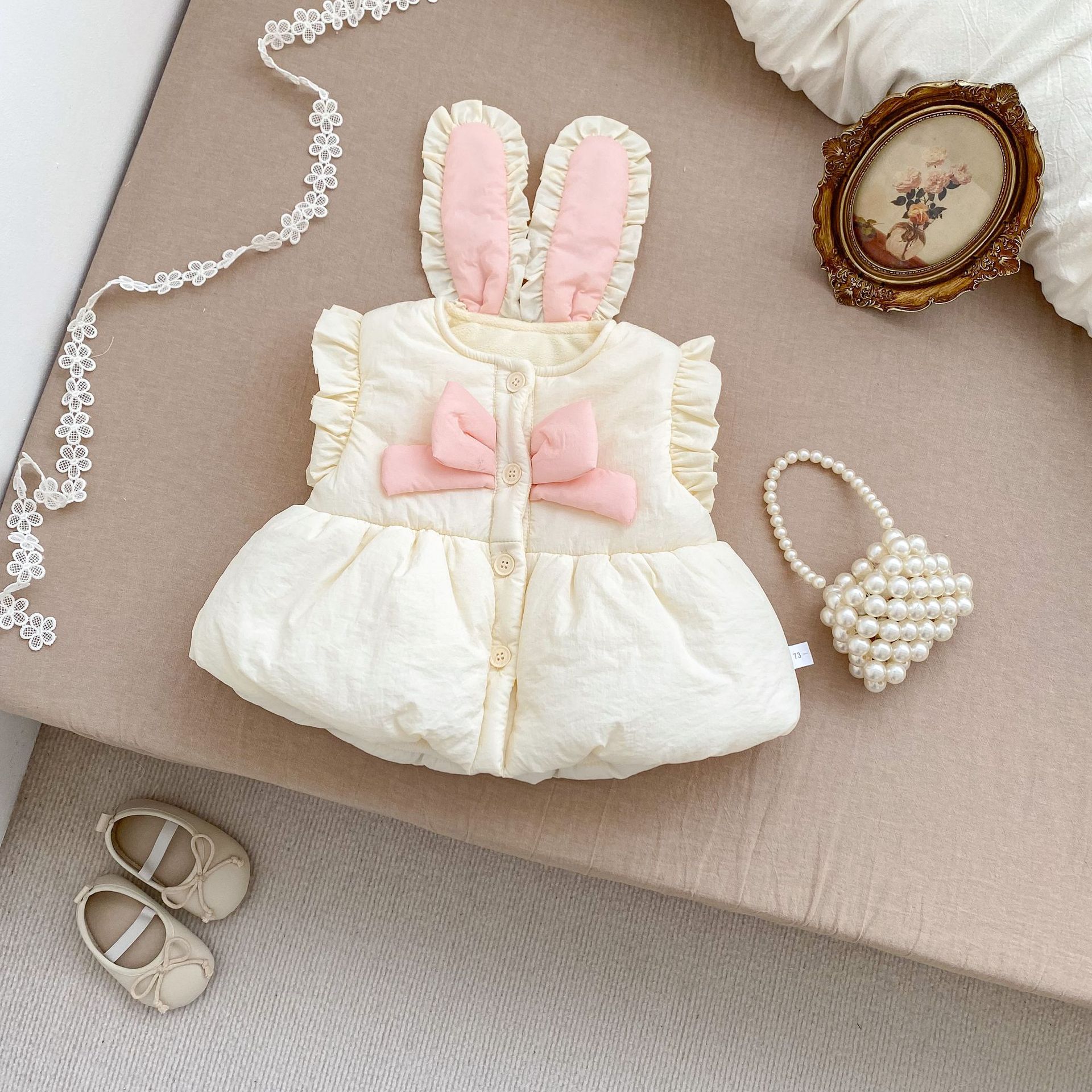 Cute bunny ear bow cardigan for girls, stylish quilted vest for autumn.
