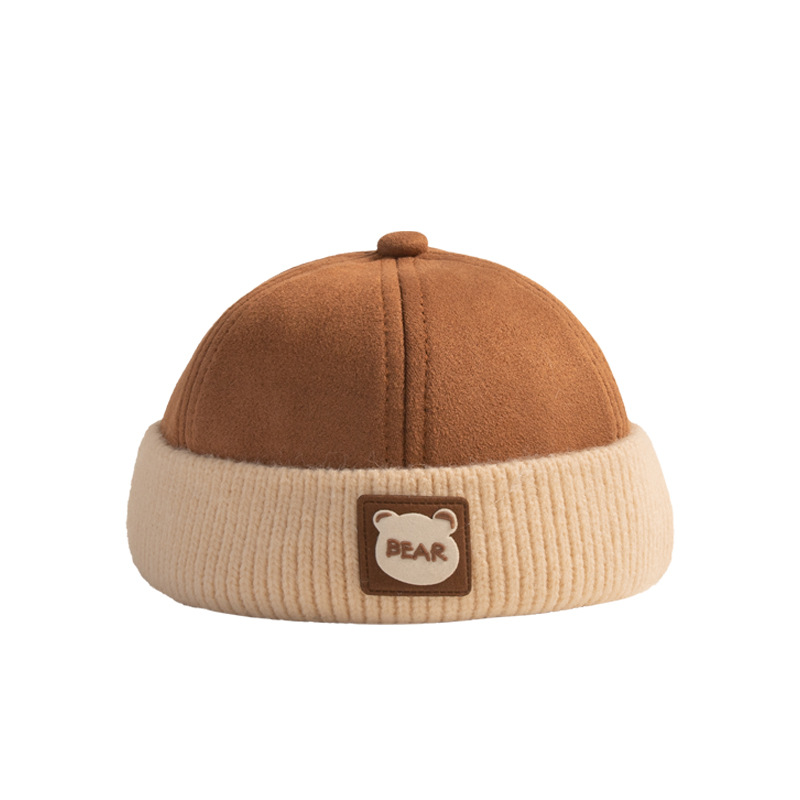 Otoño y invierno coreano estilo exterior sin bordes de color engrosado sombrero de niños para hombres y mujeres bebés caliente sombrero de piel de melón de moda universal