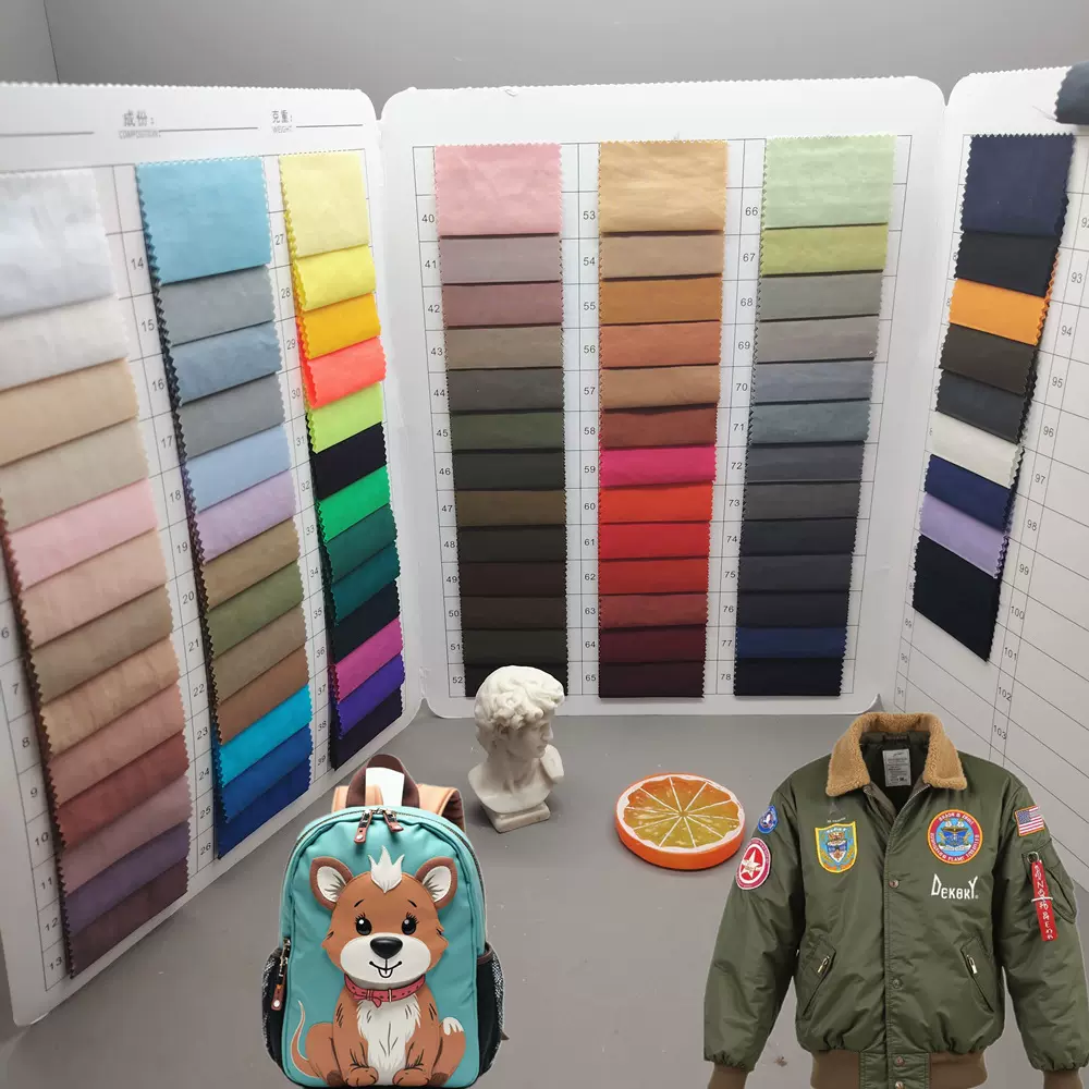 340T高密尼龙斜纹面料 微皱防水美式飞行夹克机车棒球服书包布料