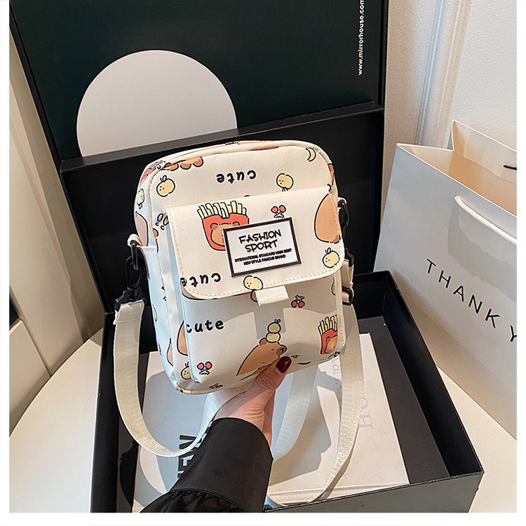 Cartoon animal print, many pockets, few bags, single-shoulder bag for girls, large capacity, cute graffiti, lightweight schoolbag for primary and middle school students undefined