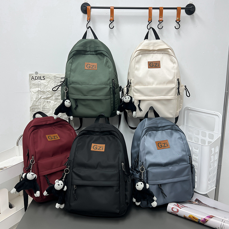 Mochila de la escuela secundaria de las niñas mochila para estudiantes universitarios de gran capacidad bolso casual de moda de los hombres de moda mochila de estilo coreano