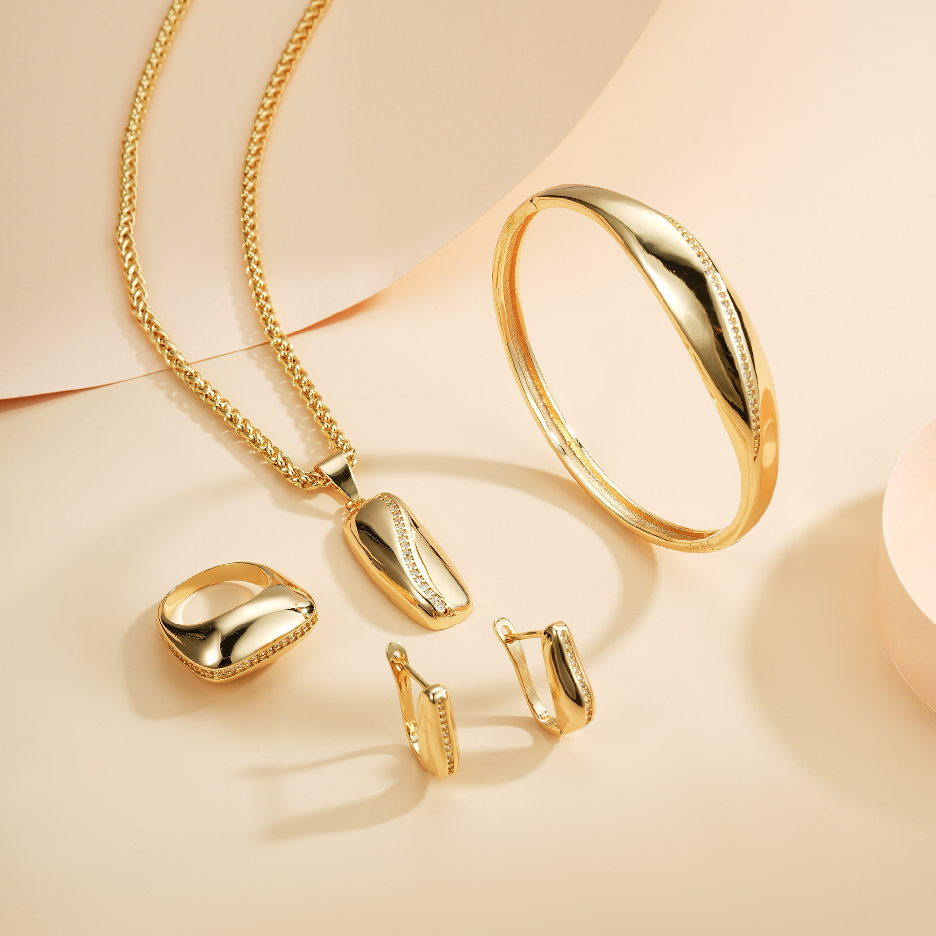 Juegos de joyas transfronterizas de alto nivel de pulido de oro 14 quilates colgante collar anillo pendientes brazalete joyas