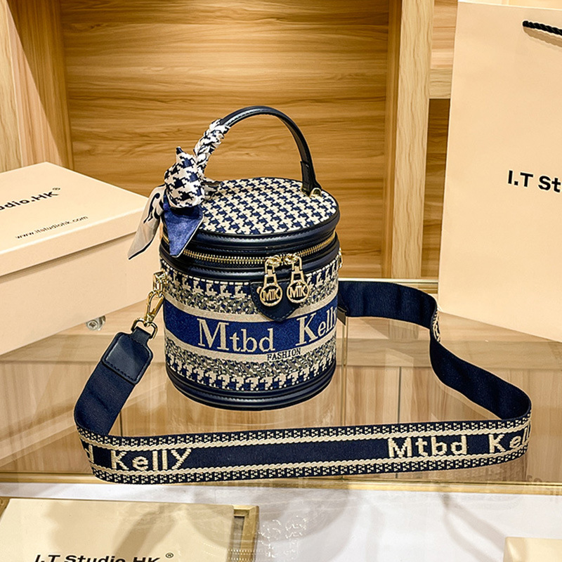 香港正品真皮圆柱形水桶包女斜挎手提单肩圆筒女包包2021新款爆款