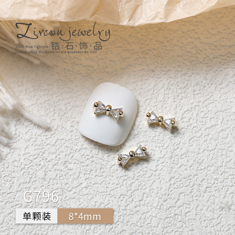 En LÍNEA DE MANICURA de la celebridad francés arco tridimensional uñas fototerapia avanzada cristal decorativo tamaño pequeño metal joyería diamante circón