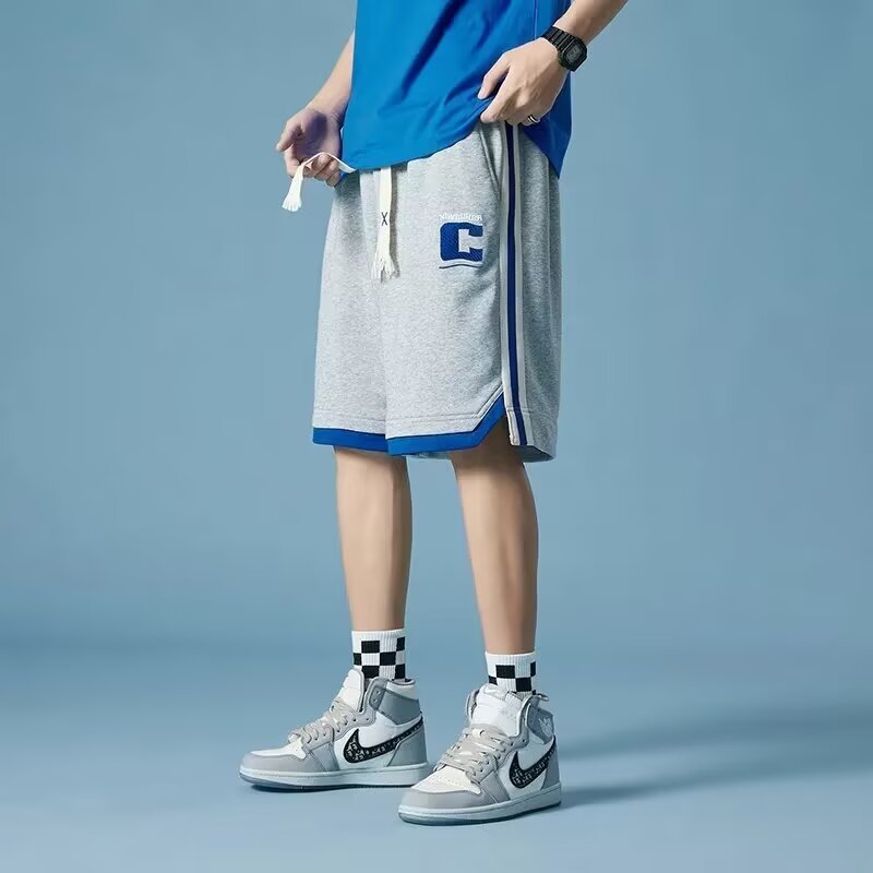 Pantalones de cinco puntos estadounidenses a rayas para hombres y mujeres, pantalones de baloncesto de moda de moda de verano para hombres