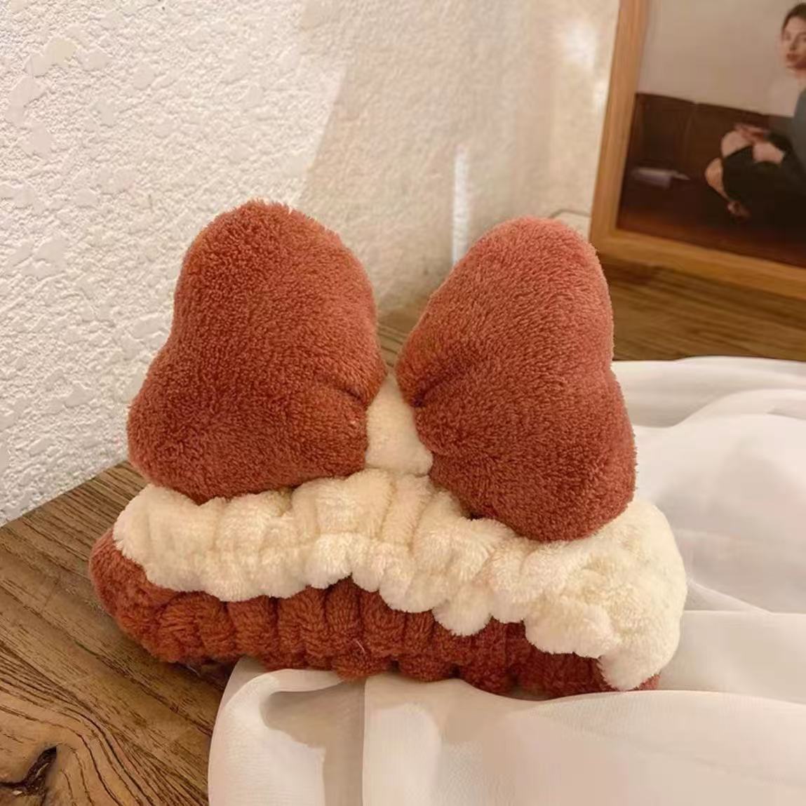 Otoño y invierno dibujos animados peluche lavar la cara cinturón de cabello máscara de mujer lavar la cara cinturón de cabello impermeable estereoscópico impermeable adornamientos de cabello al por mayor