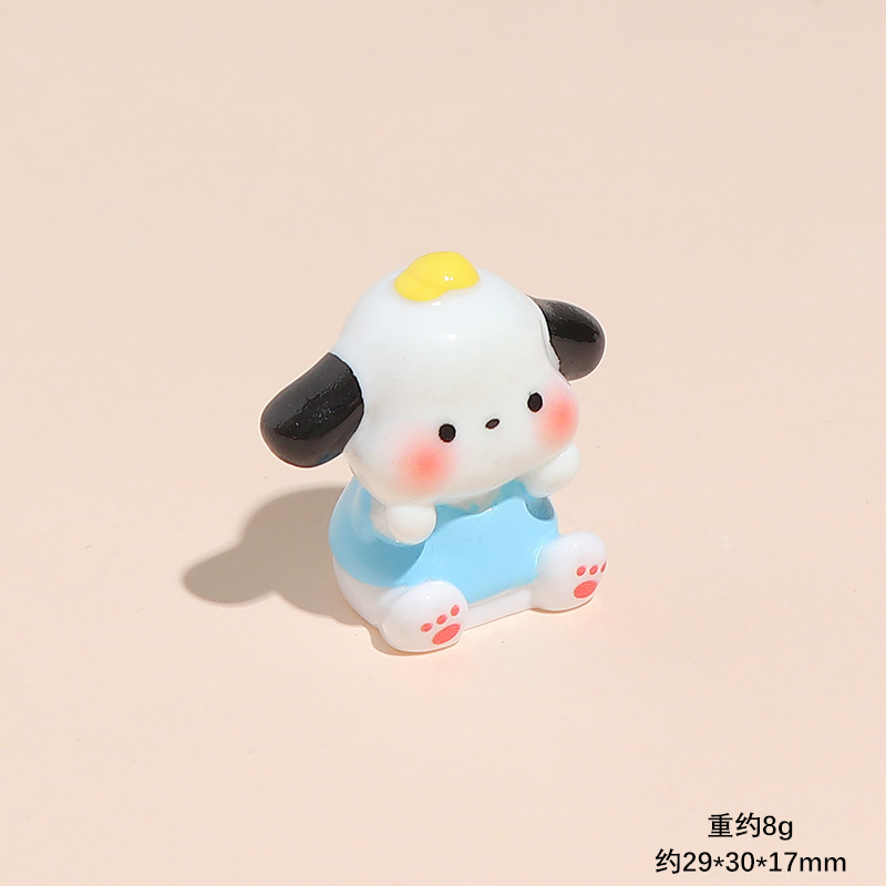 파란 옷을 입은 강아지