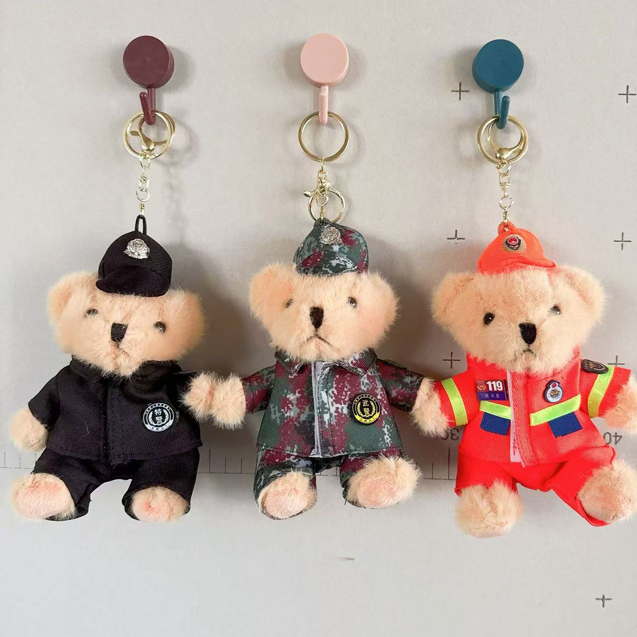 Políticas de tráfico en línea juguetes de peluche muñecas de agua de oso colgante bolso colgante llavero 4 pulgadas muñecas agarrar