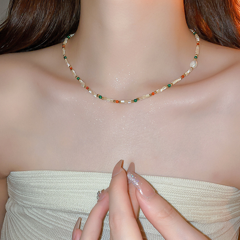 Collar de perlas con lazo de súper hada, cadena de clavícula de moda de lujo ligero francés, sentido de alta gama, joyería de nicho de arte, mujer al por mayor