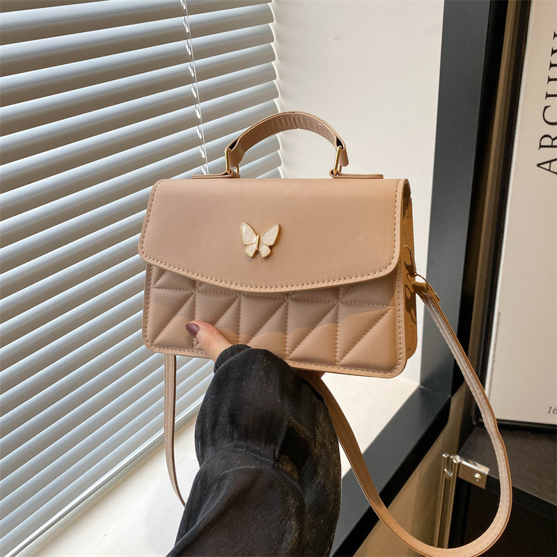 Bolsas para mujeres 2024 verano nuevo diseño de nicho de mariposa de alta calidad estilo de moda de diamante universal de hombro pequeño bolso de moda