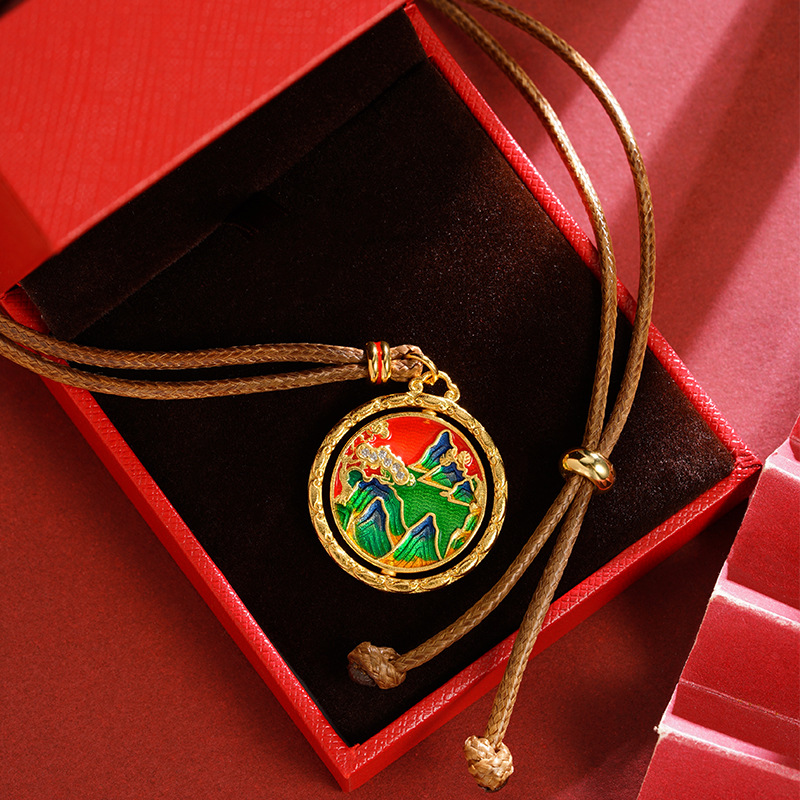 La antigua herencia de China viento verde montaña agua verde nubes auspiciosas puede girar oro de arena vietnamita joyería de latón retro al por mayor