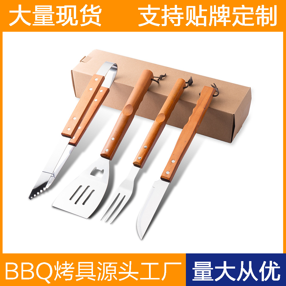 Venta al por mayor de fábrica de exportación de Amazon barbacoa herramientas traje de 4 piezas de madera grano pala de registro tenedor traje de combinación