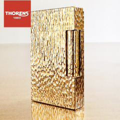 The brand originates from Swiss THORENS gas lighter creative brass hand-carved crater