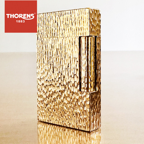 The brand originates from Swiss THORENS gas lighter creative brass hand-carved crater