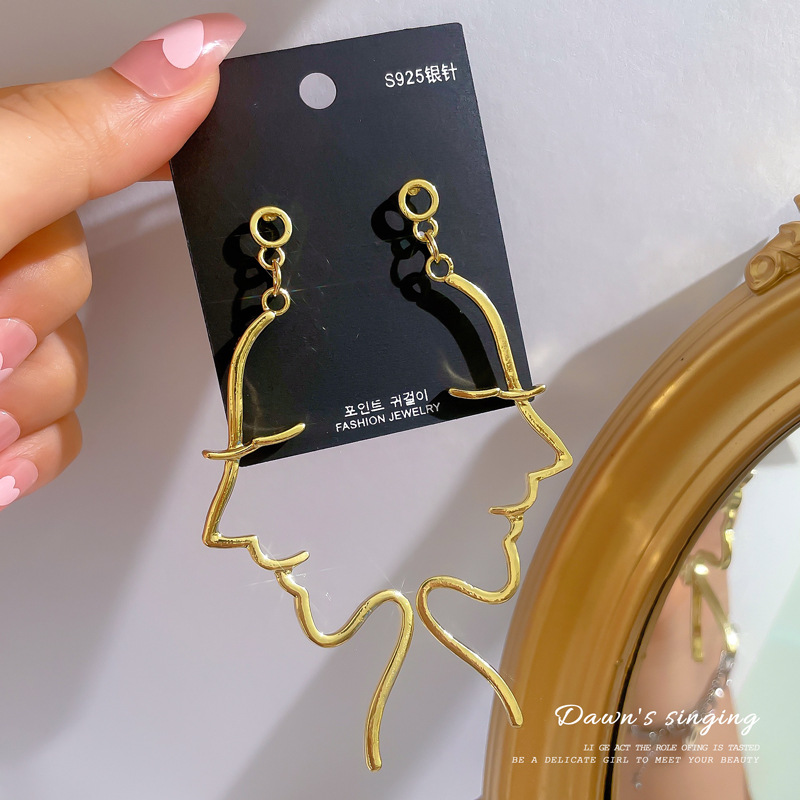 Ins Style Minimalist Fun Face Earrings Hollow Abstract Earrings Korean Personality Design Exaggerated Long Earrings display picture 3