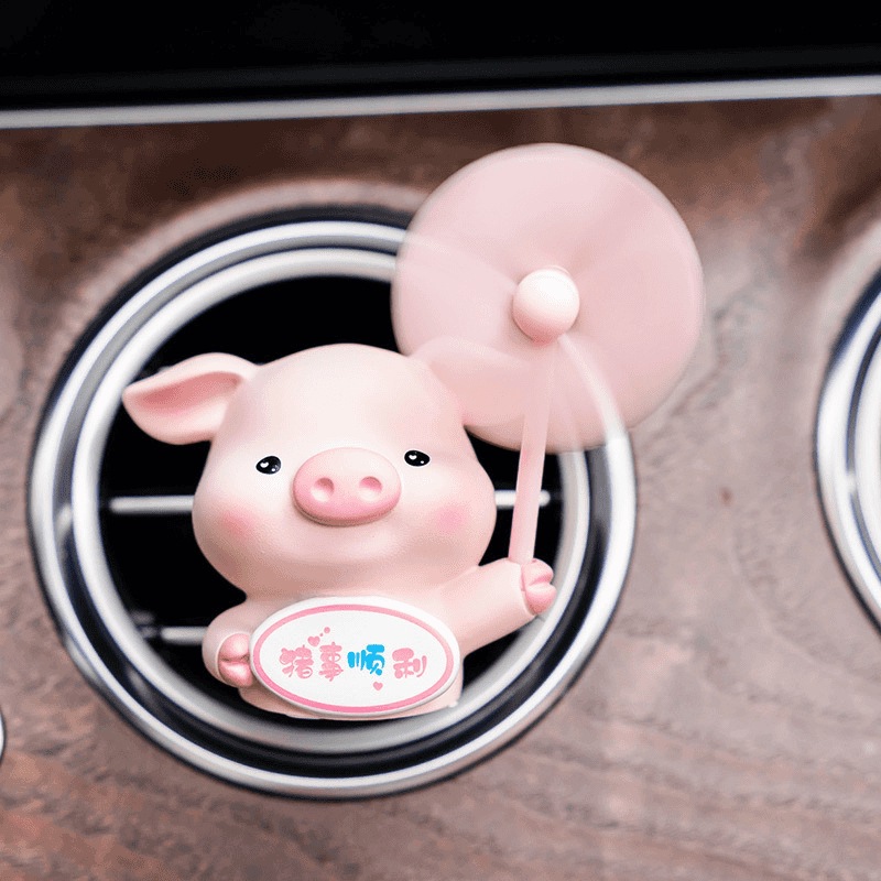 Aire acondicionado del automóvil salidas de aire decoraciones aromáticas dibujos animados lindo cerdo coche eléctrico consola adornos de perfume montados en el automóvil