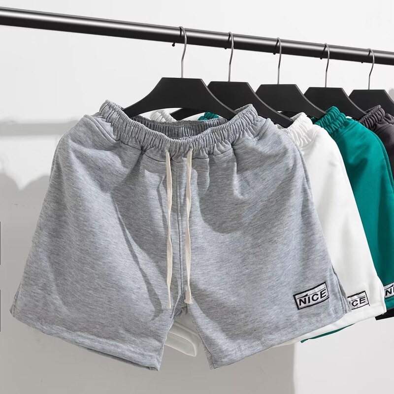 High-end sports shorts men's home 3-point pants 4-point running fitness quarter pants knitted cotton slit three-point pants