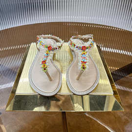 2025新款法式水钻花朵配裙子夹趾平底罗马凉鞋女夏外穿精致百搭