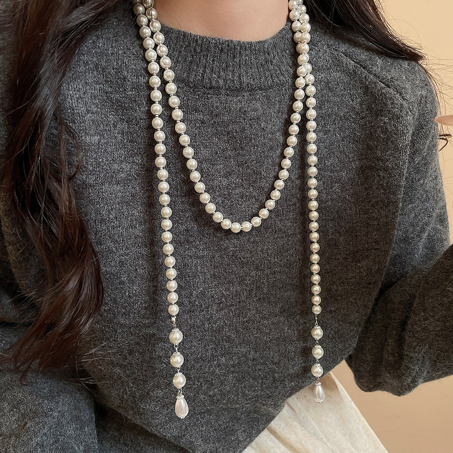 不規則な長いタイプの真珠のネックレスのフランス式の軽い豪華な気質のセーターのチェーンの小さい大衆のシンプルで高級感の項は卸売りの女性を飾ります。