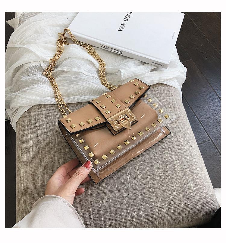 Borsa a tracolla a catena con tracolla a catena piccola trasparente con rivetti versatili alla moda da donna_voghion.com