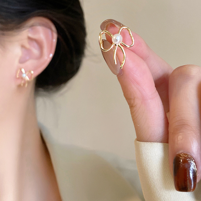 Aguja de plata, perla, circón, borla, pendientes de moda, lujo ligero, pendientes de alta gama, pendientes de todo fósforo exquisitos de nicho, mujeres al por mayor