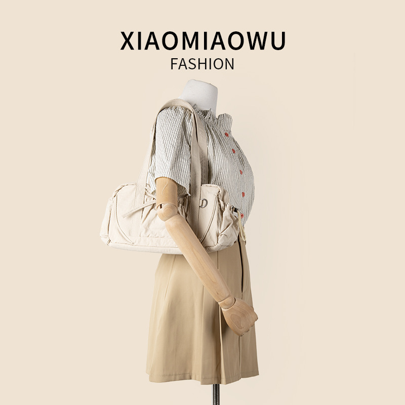 Student shoulder large capacity, women's simple bow nylon handbag, new niche style, armpit bag, high-end feel_voghion.com