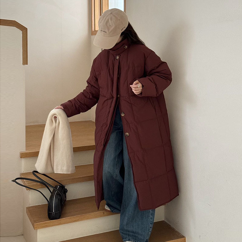 한국 스타일 무릎 위 길이의 여성용 롱 다운 재킷 2025 겨울 신상품 스탠드 칼라 싱글 버튼 두꺼운 흰색 오리털 독특한 디자인 코트