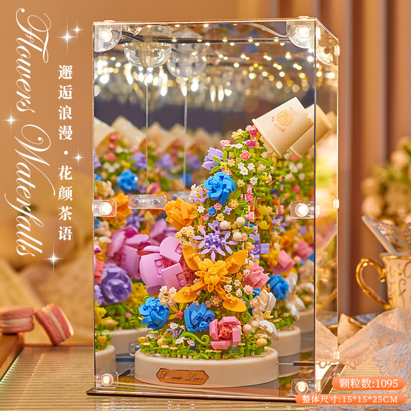 積み木の花がバラのオルゴールを飾っています。|undefined