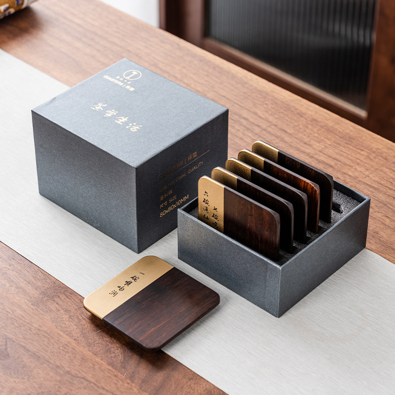 Ébano montaña ligera de lujo de cobre de madera combinado almohadilla de aislamiento de kung fu juego de té titular de la taza de té del hogar accesorios del juego de té al por mayor Negro