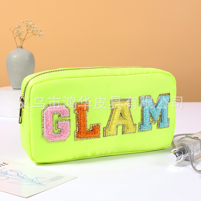 Transfronterizo amazon popular toalla bordada carta de nylon bolsa de cosméticos bolsa de almacenamiento de gran capacidad informal de las mujeres a prueba de agua