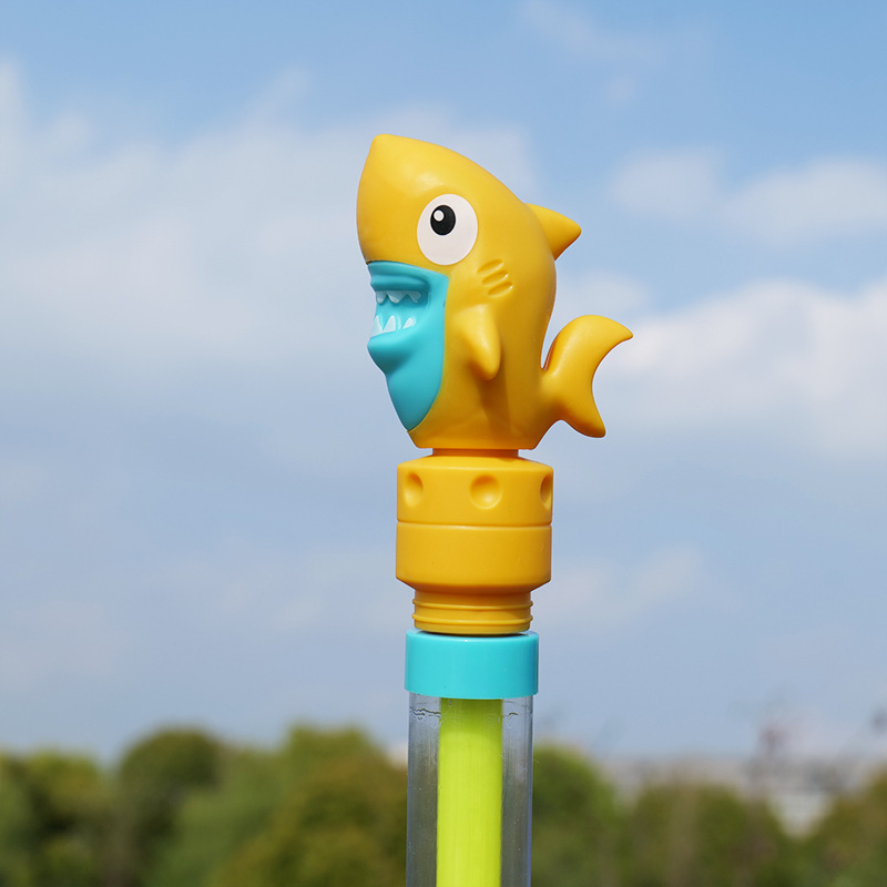 Juguetes del día de los niños Pistola de agua de dibujos animados tipo de extracción de agua de gran capacidad para niños y niñas jugando en la playa juguetes de agua al por mayor