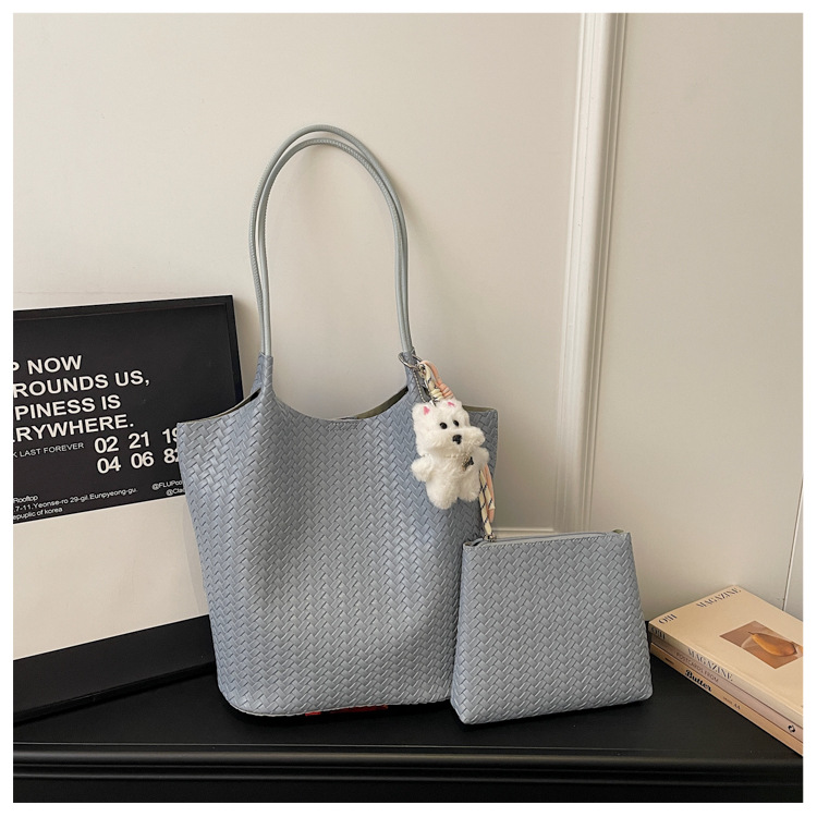 Bolsa coreana de gran capacidad para mujeres 2026 verano nuevo estilo de moda trenzado bolso de hombro axilar de viaje bolsa de ocio
