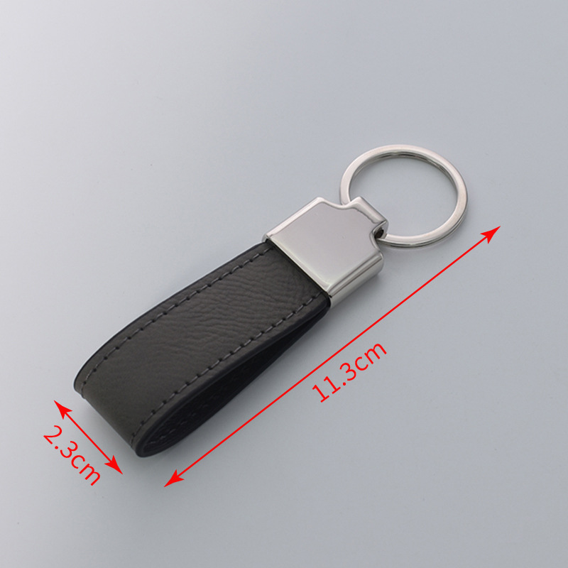 Transfronterizos en blanco spot embrión láser de cuero llavero de metal cuero colgante de automóvil personalizado regalos de negocios de alta calidad